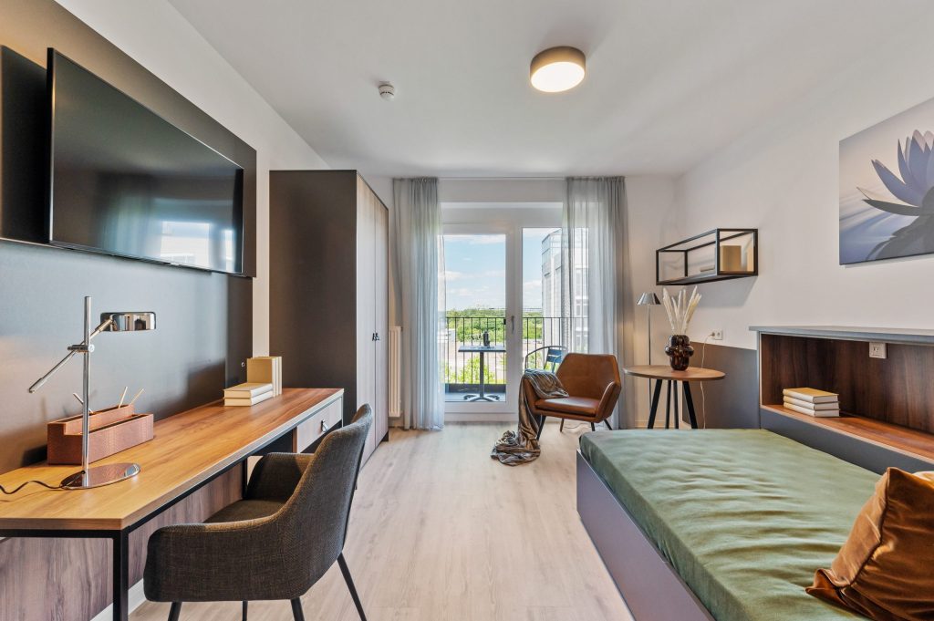 Apartment mit Bett, TV und Sitzplatz – Eschborn – Campo Novo Aparthotel