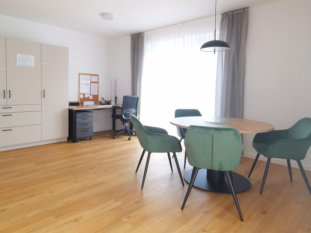 Dining area by the window – Nordhorn – Neuberliner Hof Residential Community